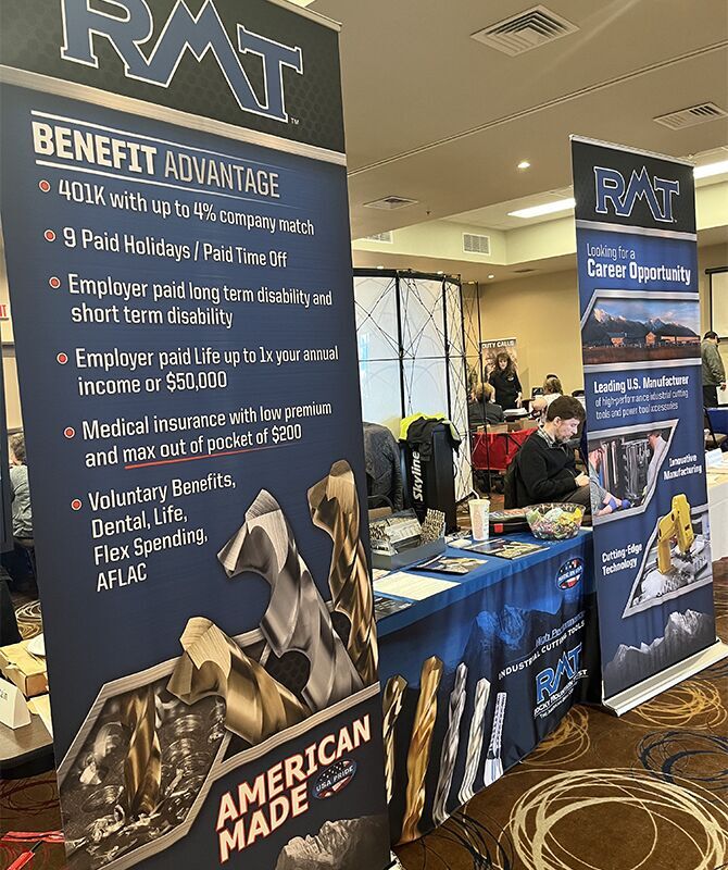 Local employers set up informational booths to attract potential employees.